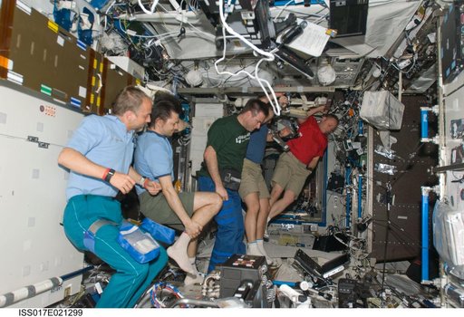 Expedition 17 / 18 participate in a news conference in the U.S. Laboratory