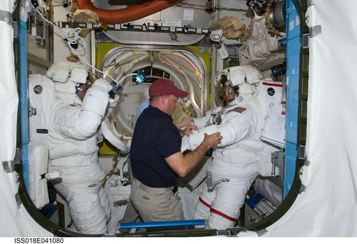 Extravehicular Activity (EVA) 1 Extravehicular Mobility Unit (EMU) Suit Preparations in Joint Airlock Quest