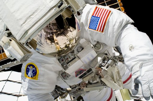 STS-119 Extravehicular Activity (EVA) 1 Swanson in Extravehicular Mobility Unit (EMU)
