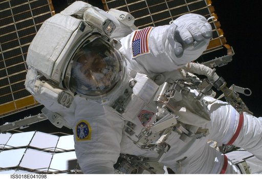 STS-119 Extravehicular Activity (EVA) 1 Swanson in Extravehicular Mobility Unit (EMU)