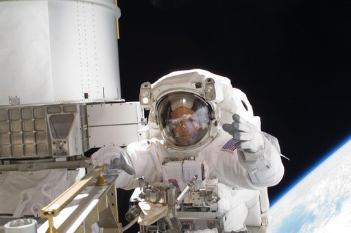 STS-119 Extravehicular Activity (EVA) 1 Arnold in Extravehicular Mobility Unit (EMU)