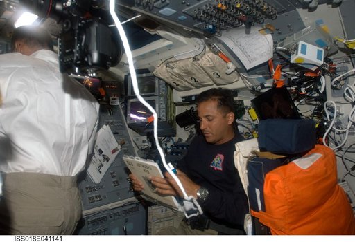 Acaba on Flight Deck (FD) during STS-119 Extravehicular Activity (EVA) 1