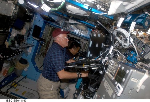 Phillips and Wakata Space Station Remote Manipulator System (SSRMS) Support for STS-119 Extravehicular Activity (EVA) 1