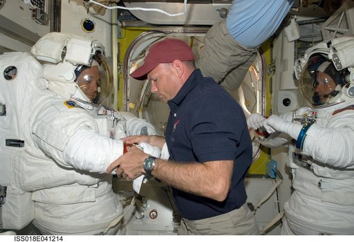 STS-119 Extravehicular Activity (EVA) 1 Extravehicular Mobility Unit (EMU) Doff