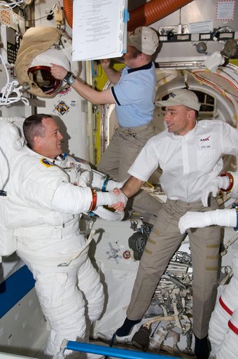 STS-119 Extravehicular Activity (EVA) 1 Extravehicular Mobility Unit (EMU) Doff