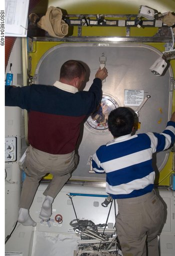STS-119 Extravehicular Activity (EVA) 2 Extravehicular Mobility Unit (EMU) Doff