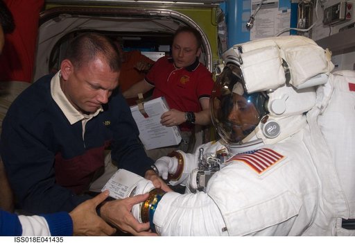 STS-119 Extravehicular Activity (EVA) 2 Extravehicular Mobility Unit (EMU) Doff
