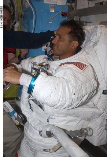 STS-119 Extravehicular Activity (EVA) 2 Extravehicular Mobility Unit (EMU) Doff