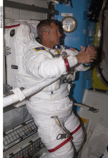 STS-119 Extravehicular Activity (EVA) 2 Extravehicular Mobility Unit (EMU) Doff