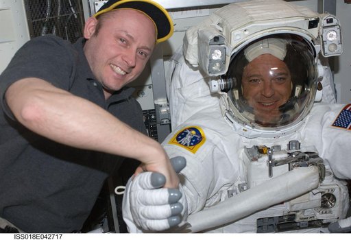 Extravehicular Mobility Unit (EMU) Preparations in Joint Airlock Quest