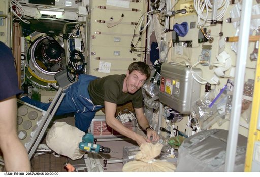 Krikalev in Service module with tools