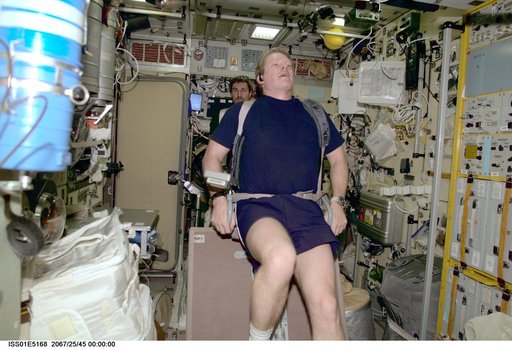 Shepherd on ergometer in Service module
