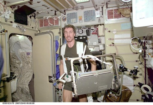 Krikalev on ergometer in Service module