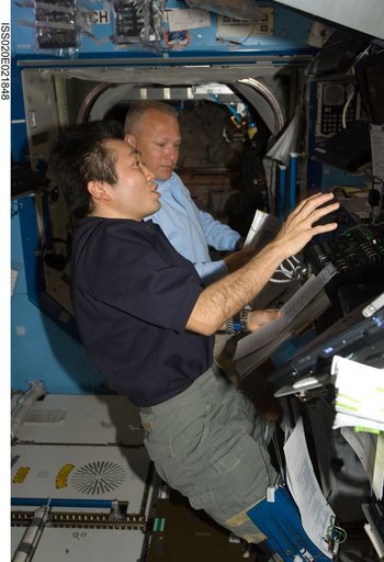 Wakata and Hurley at SSRMS controls