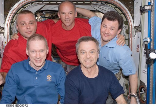 View of Expedition 21 Crew Members posing for a photo in the Node 2