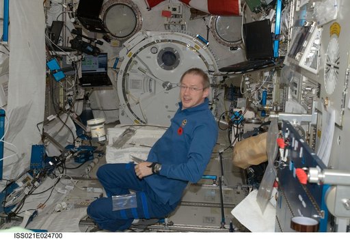 Commander De Winne poses for a photo during Air Sampling