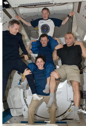 Expedition 21 Crew Members pose for a photo