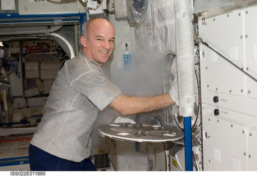Williams installs the APXC Payload in MELFI during Expedition 22