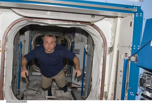 Suraev in the hatch area of the JPM during Expedition 22