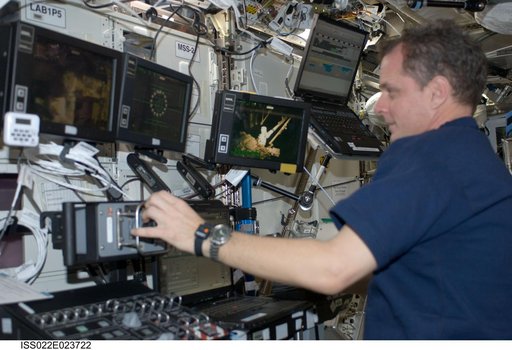 Creamer at the SSRMS Canadarm2 Workstation in the U.S. Laboratory during Expedition 22