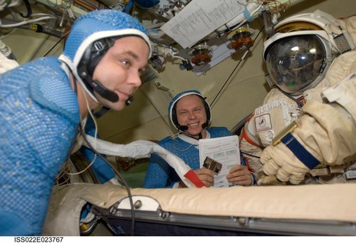 Suraev and Kotov wearing LCVG in the Pirs DC-1 during Expedition 22
