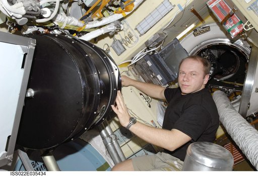 Kotov works with Plasma Crystal-3+ Experiment in the SM during Expedition 22