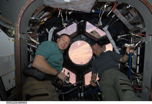Virts and Williams in the Cupola Module during Joint Operations