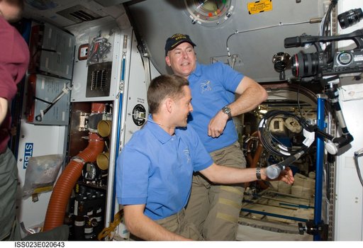 Crewmembers in Node 2 following Hatch Opening