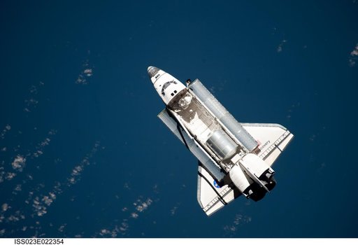 Discovery and Payload on Approach to ISS during the STS-131 Mission