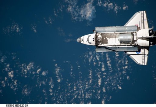 Discovery and Payload on Approach to ISS during the STS-131 Mission