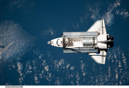 Discovery and Payload on Approach to ISS during the STS-131 Mission