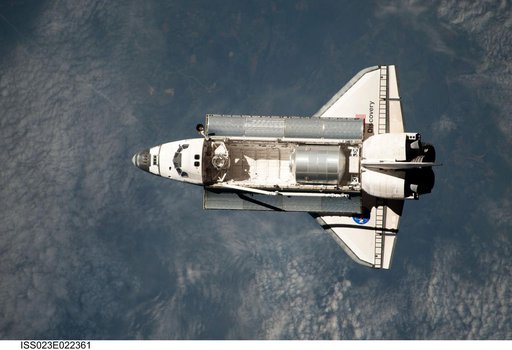 Discovery and Payload on Approach to ISS during the STS-131 Mission