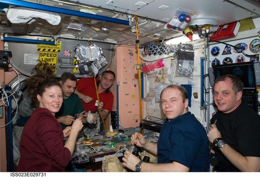 Crewmembers Share a Meal in Node 1