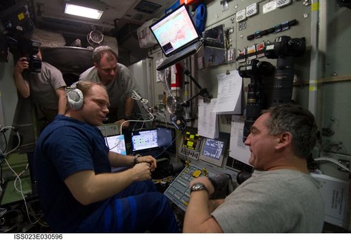 Crewmembers in SM during Progress 37P Docking