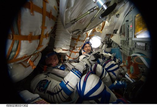 Crewmembers in Soyuz TMA-17/21S during Sokol Suit Leak Check