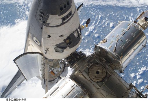 View of the FWD ISS and docked Atlantis during EVA 1