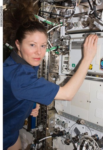 FE Caldwell Dyson works with the MERLIN in the US Lab