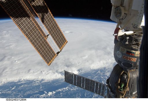 View of Soyuz Spacecraft backdropped by Hurricane Earl