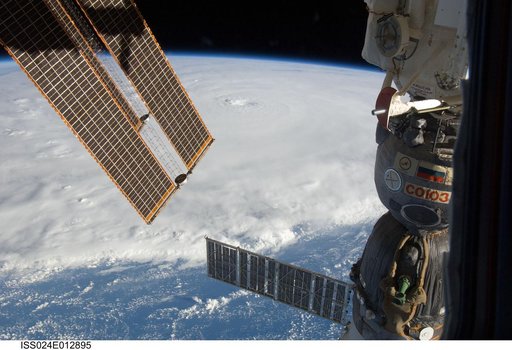 View of Soyuz Spacecraft backdropped by Hurricane Earl