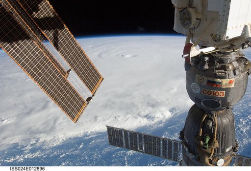 View of Soyuz Spacecraft backdropped by Hurricane Earl