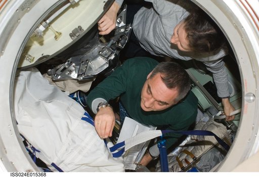 View of Expedition 24 Crew Members preparing for Soyuz Undocking