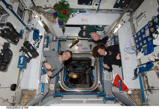 Expedition 26 Crewmembers in sleeping quarters