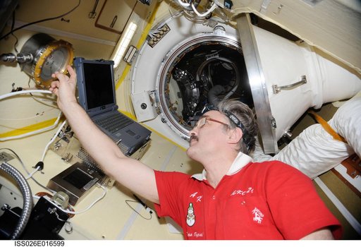 Kaleri looks at the Absolute Pressure Gauge in the MRM-2 during Expedition 26