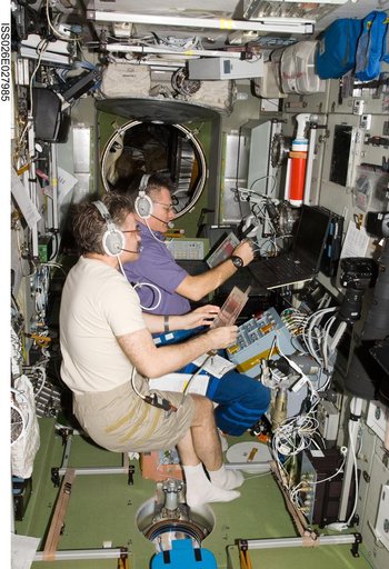 Kaleri and Nespoli at the TORU Docking System