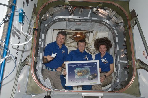 Expedition 27 Crew with HTV2 Poster and Paper Cranes