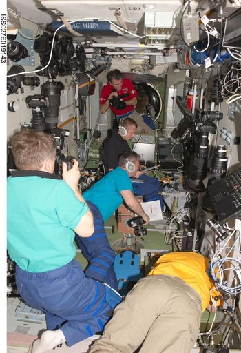 Crewmembers in the SM during Progress 42P Docking