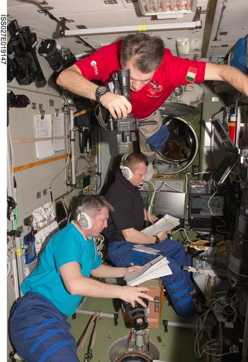 Crewmembers in the SM during Progress 42P Docking