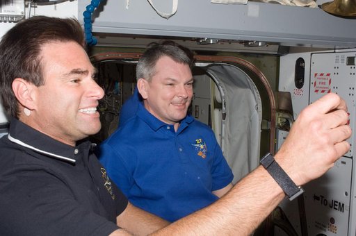 Chamitoff and Samokutyaev in Node 2 following STS-134 Hatch Opening