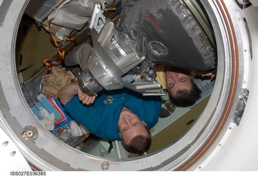Expedition 27 Crewmembers during Soyuz TMA-20/25S Hatch Closing