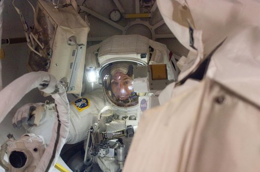View of STS-134 MS Feustel working during EVA-3